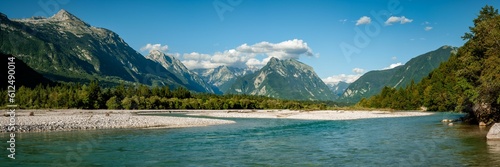 Panoramic view of a river and mountains in Triglav National Park, Slovenia photo