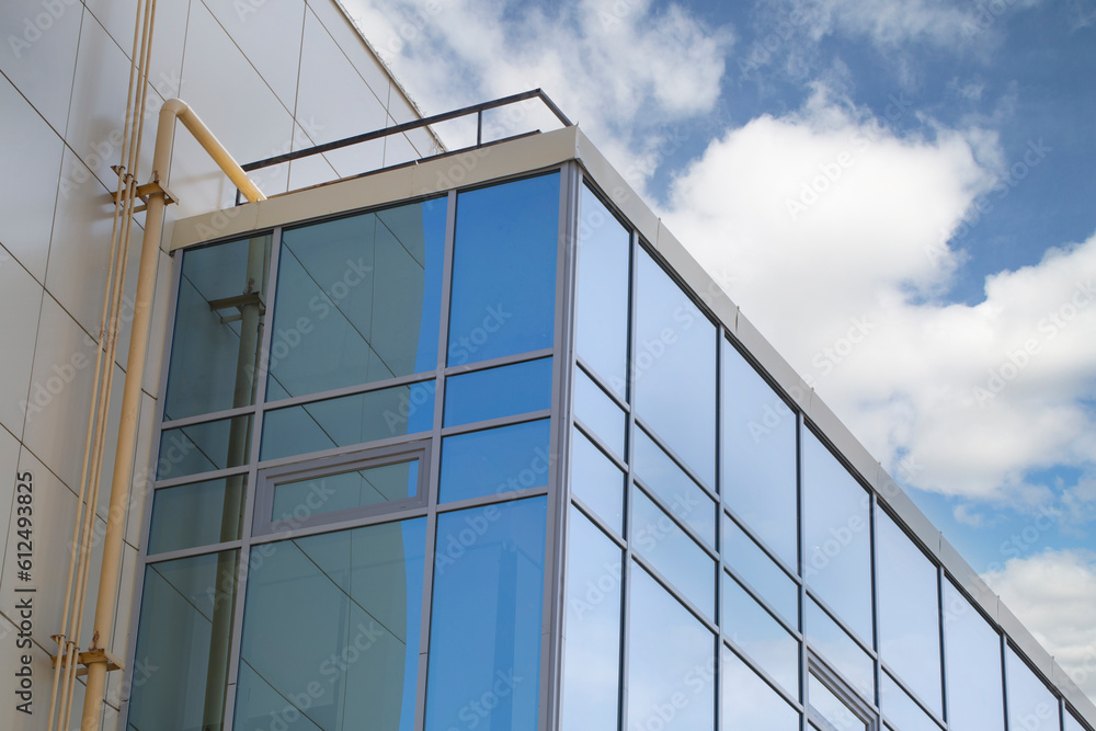 Tinting of office building windows.Exterior of a tinted building Tinting of office building windows.Exterior of a tinted building