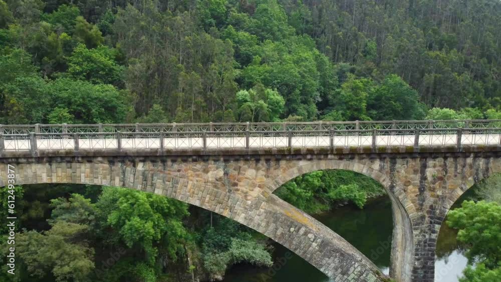 Crossing sever do vouga bridge with beautiful green forest in the back Crossing sever do vouga bridge with beautiful green forest in the back