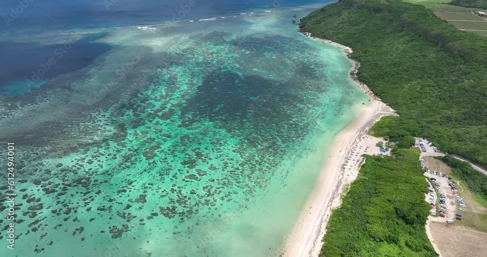 Aerial view of the clear blue ocean on Miyakojima Island, Okinawa, Japan Aerial view of the clear blue ocean on Miyakojima Island, Okinawa, Japan