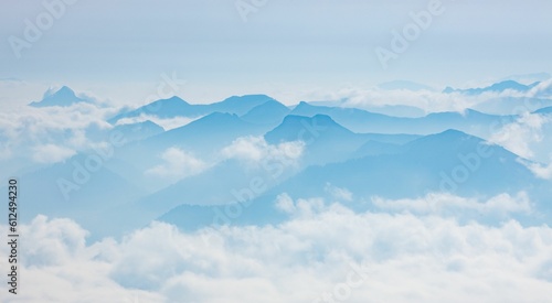 Blue skyline of Untersberg massif, mountain peaks of the Berchtesgaden Alps in clouds