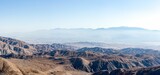 Beautiful panorama of the mountains with a blue sky on the horizon