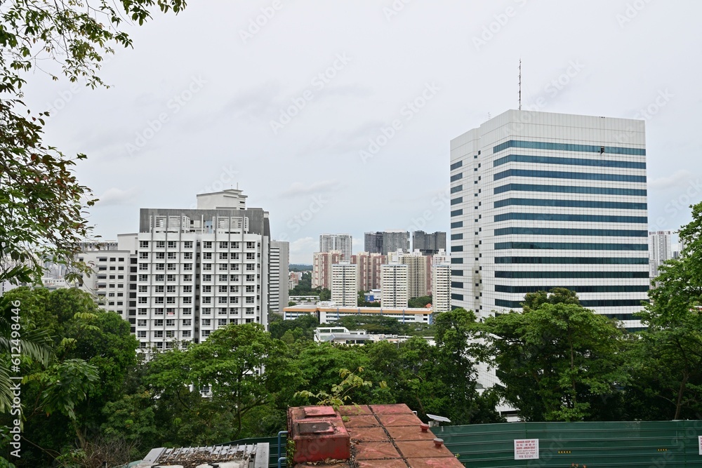 Office building and industrial estate in front of high-rise residential area, Singapore