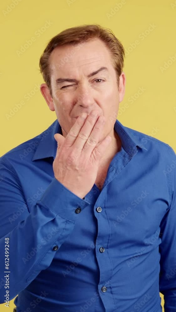 Mature man blowing a kiss to the camera Mature man blowing a kiss to the camera