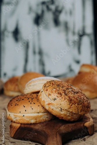Closeup of freshly-baked buns arranged on a brown paper