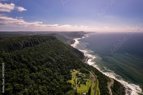 Scenic view of Coledale village on an evergreen hill on the coast of the ocean in Australia photo