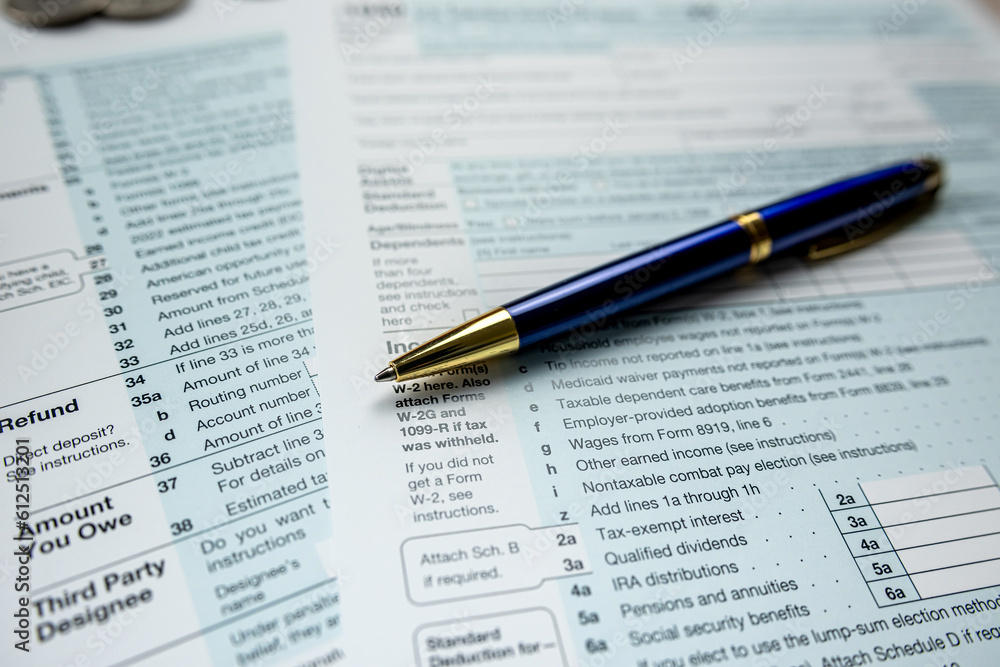 Blank 1040 tax form with pen Blank 1040 tax form with pen