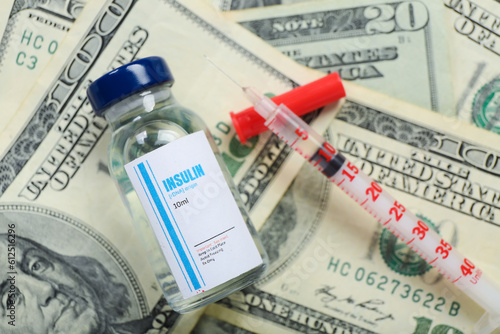 Insulin with syringe on dol...