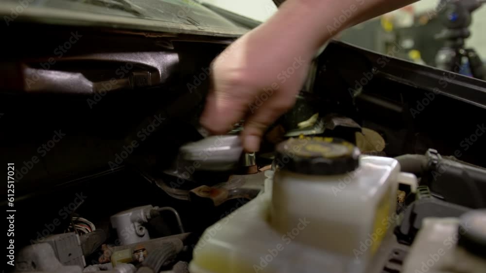 Skillful man fixing car. Car service, repair maintenance Skillful man fixing car. Car service, repair maintenance