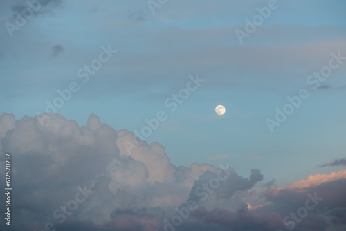 Tranquil Blue Moonlit Sky with Heavy Clouds and Scenic Nature Beauty