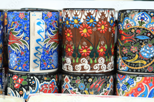 Collection of empty colorful decorative ceramic mug
