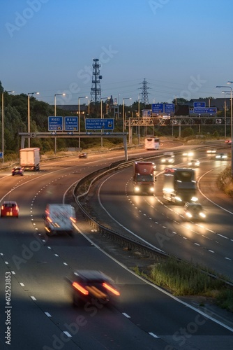Traffic on M5 motorway near Bristol, UK, during the early evening. Moving cars are slightly blurred.