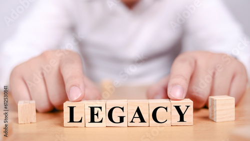 Legacy, text words typography written with wooden letter, life and business motivational inspirational