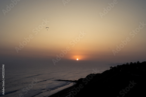 Sunset in la Costa Verde (Green Coast) in Lima, Peru photo