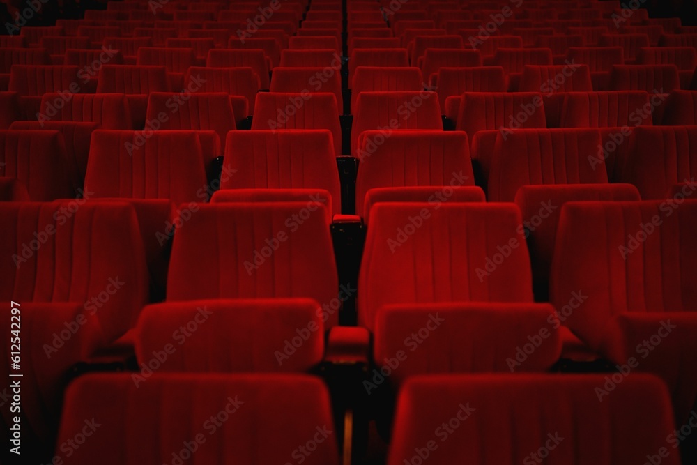 Beautiful view of empty red theater seats- perfect for background and wallpaper use Beautiful view of empty red theater seats- perfect for background and wallpaper use