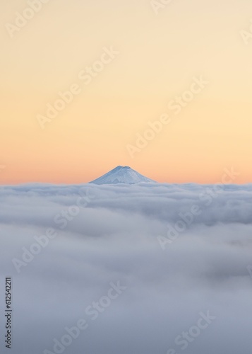 Cotopaxi volcano coming out of the clouds