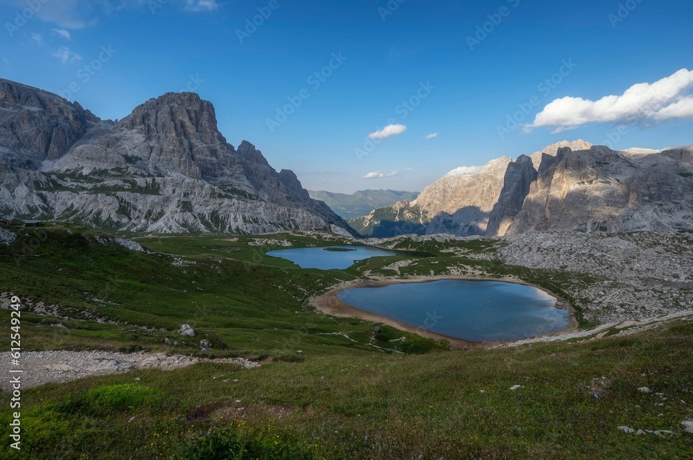 Obraz premium Landscape of Tre Cime di Lavaredo Hikes mountains with lake in Dolomites, Italy