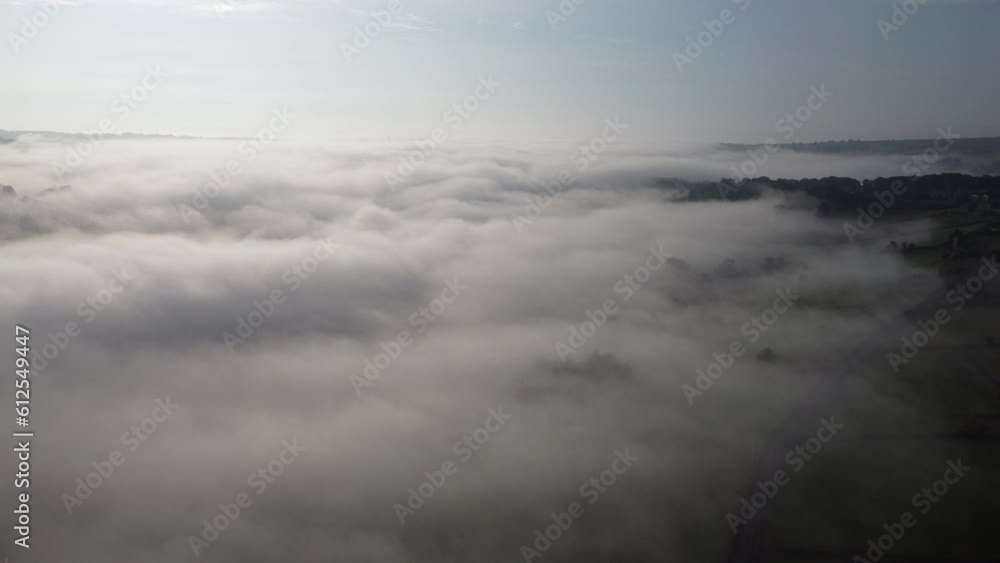 Aerial view of a layer of clouds over mountains in Halifax, Yorkshire Aerial view of a layer of clouds over mountains in Halifax, Yorkshire