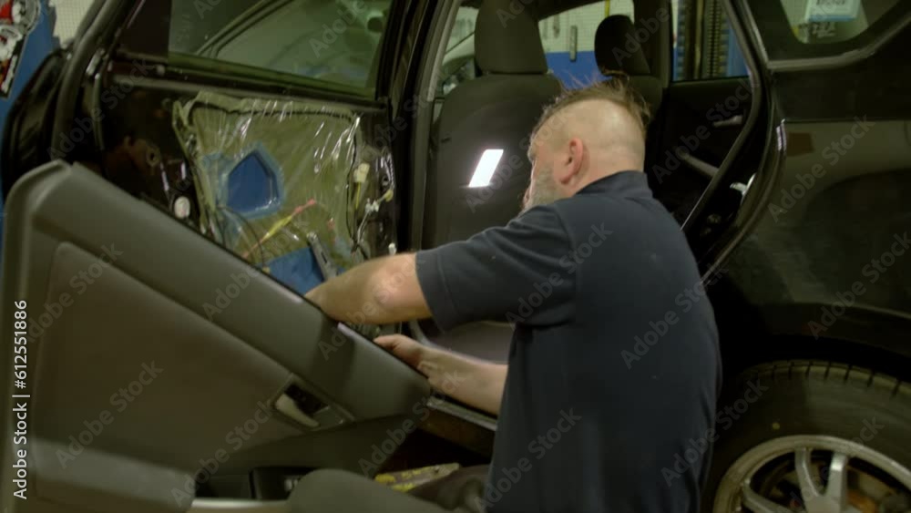 Mechanic man examining and maintenance to customer a vehicle car Mechanic man examining and maintenance to customer a vehicle car