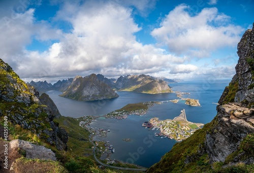 Scenic view of Lofoten Islands with buildings under the cloudy sky, Norway