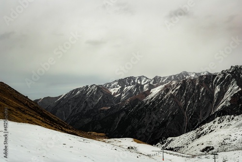 Beautiful view of a snowy mountainous landscape © Nikita Gurzhey/Wirestock Creators