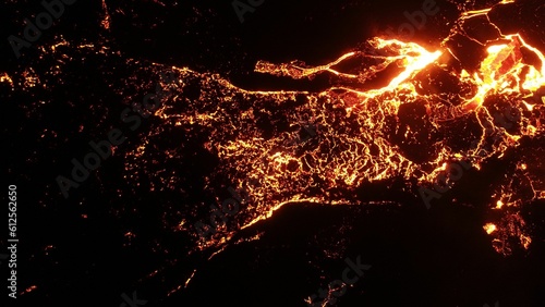 Obraz na plátně Volcanic eruption with glowing orange lava flow surrounded by a pool of bubbling