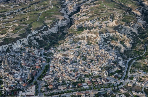 Aerial view of a Cappadocia cityscape, on a sunny day, surrounded by beautiful nature