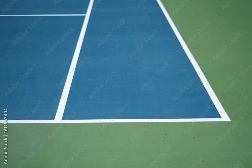 Right sideline of a blue tennis court with white lines, concept of a tennis match