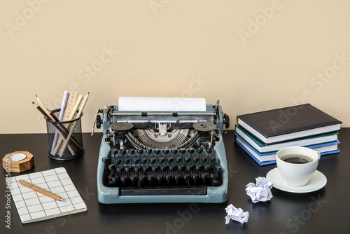 Vintage typewriter on a dar...
