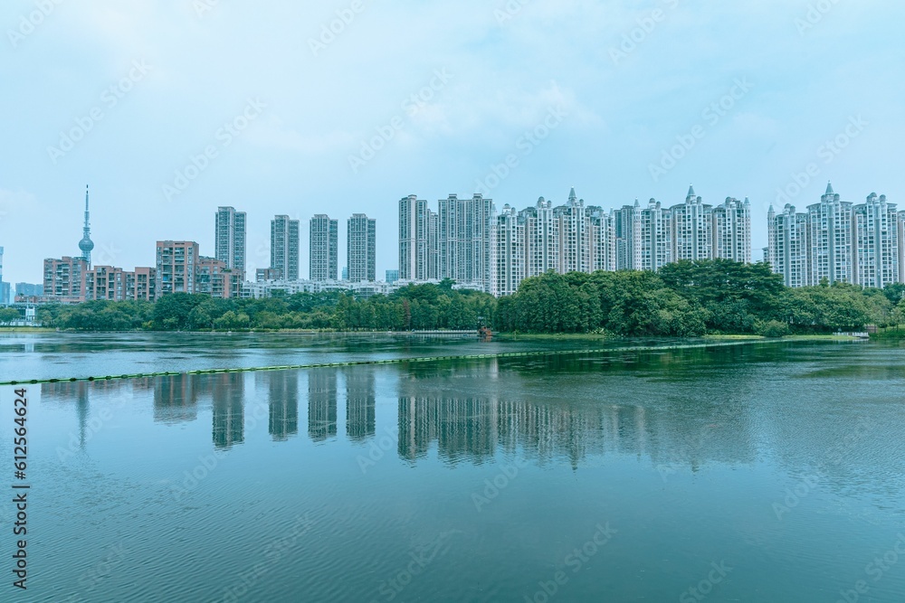 Low-angle of high-rise buildings in Fuzhou with a lake view, Fujian province, China