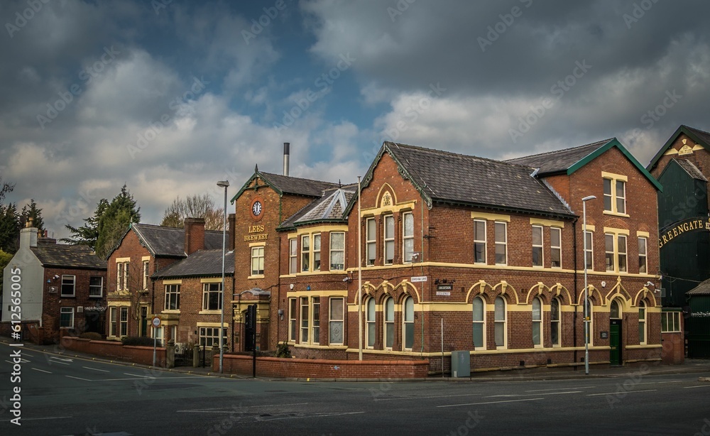 Beautiful view of the buildings under a cloudy sky at daytime in Middleton, United Kingdom Beautiful view of the buildings under a cloudy sky at daytime in Middleton, United Kingdom
