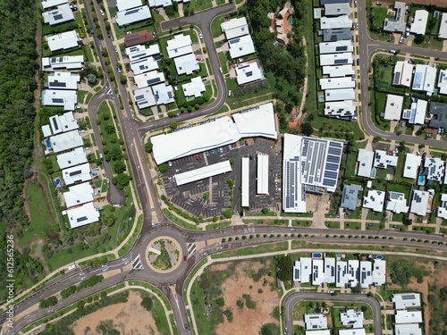 Fotografie Aerial View of a residential area with streets and houses with white roofs