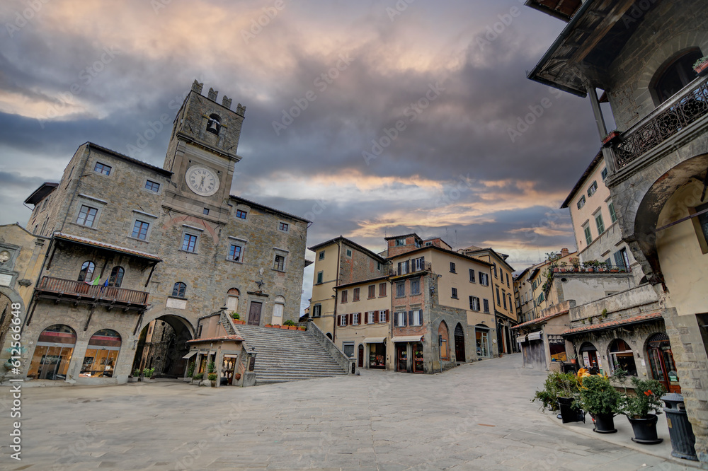 Piazza della Repubblica - the main square of the town of Cortona with a stormy clouds 