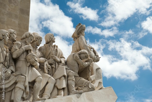 Closeup of the stone sculpture Padrao dos Descobrimentos against a cloudy sky