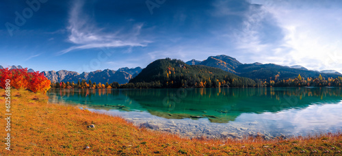 beautiful fairytale landscape in autumn with mountains in the background