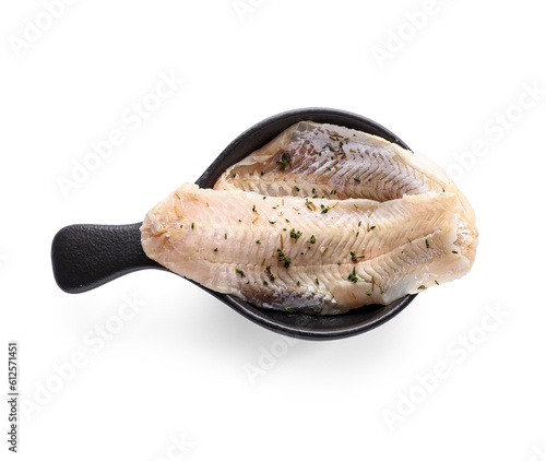 Frying pan with raw cod fillet on white background photo