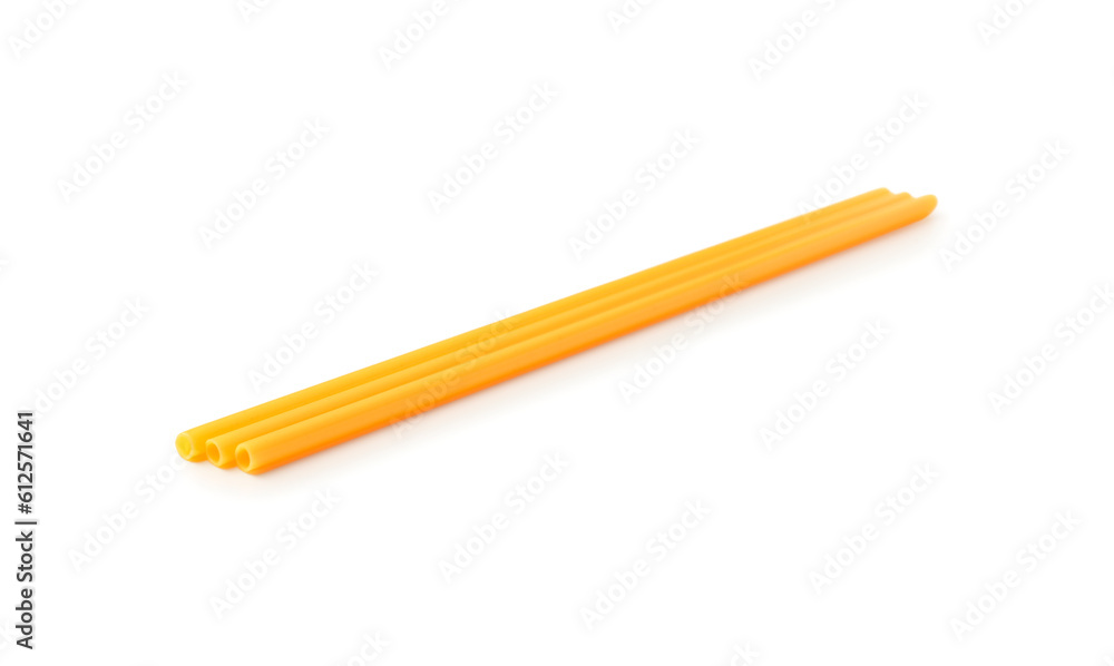 Yellow plastic straws on white background Yellow plastic straws on white background