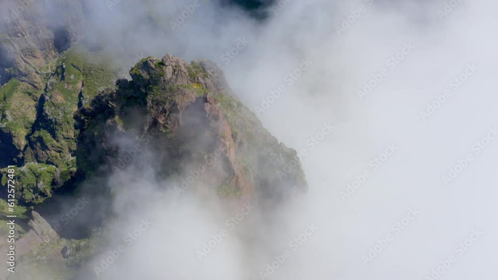 Aerial view of rocky peaks covered in clouds on Madeira Island, Portugal Aerial view of rocky peaks covered in clouds on Madeira Island, Portugal