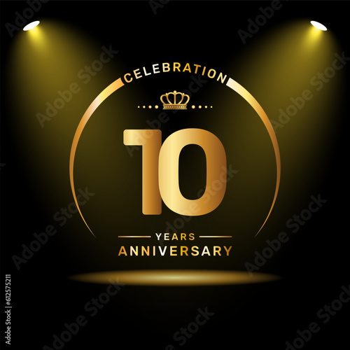 10th year anniversary celebration logo design with gold color number and ring, logo vector template