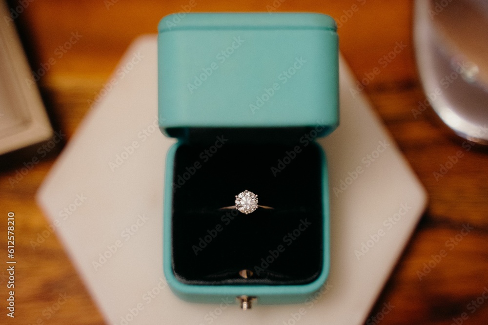 Closeup shot of a wedding ring in the blue box Closeup shot of a wedding ring in the blue box