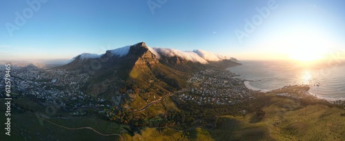 Panoramic shot of the Table Mountain in Cape Town, South Africa on a golden sunset