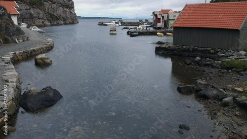 Drone view over the bridge on lake Selura and city buildings in Flekkefjord photo