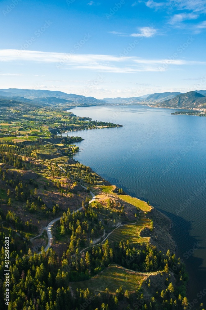 Aerial view of Penticton surrounded by Okanagan Lake and the Naramata Bench vineyards