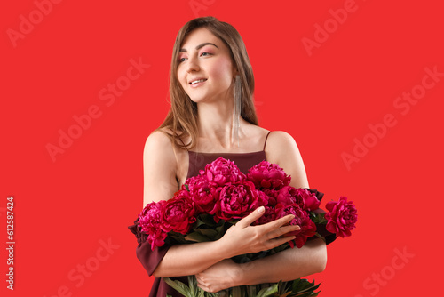 Beautiful young woman with ...
