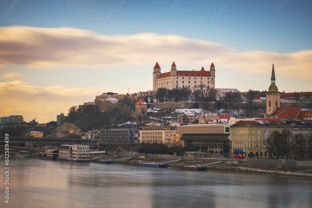 Beautiful view of the Bratislava Castle under the blue sky with white clouds
