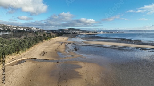 Aerial view of the shore of Gower beach located in Wales, United Kingdom