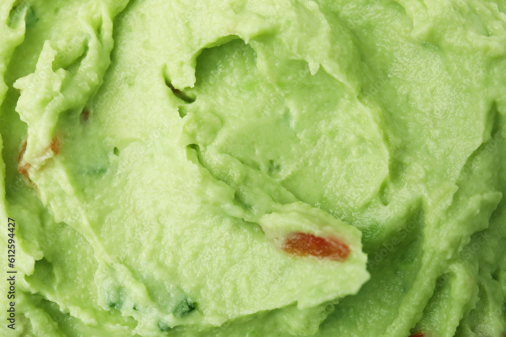 Delicious guacamole sauce as background, top view Delicious guacamole sauce as background, top view