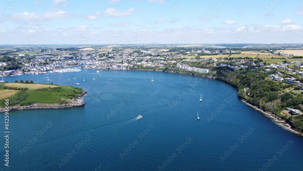 Bird's-eye view of a bay surrounded by green lands of Ireland