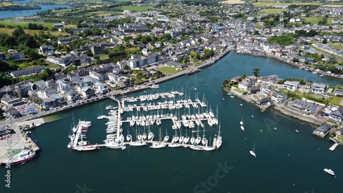 Bird's-eye view of a harbor with the background of a town in Ireland