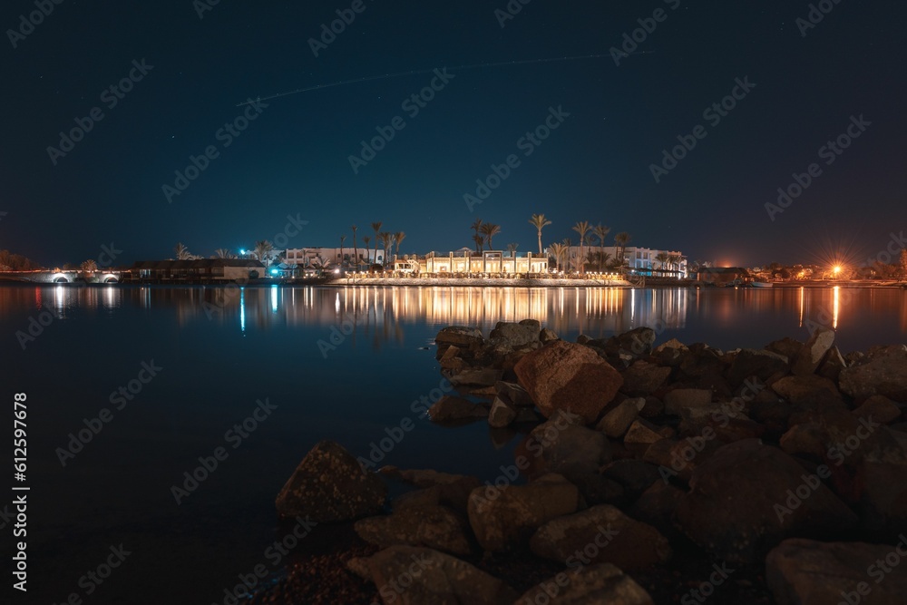 Beautiful long exposure of El Gouna lagoon with a view of a hotel at night
